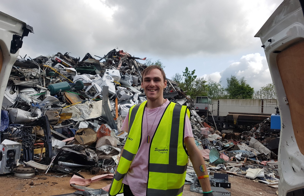 A Recycle-IT Team Member at an electronic waste site.